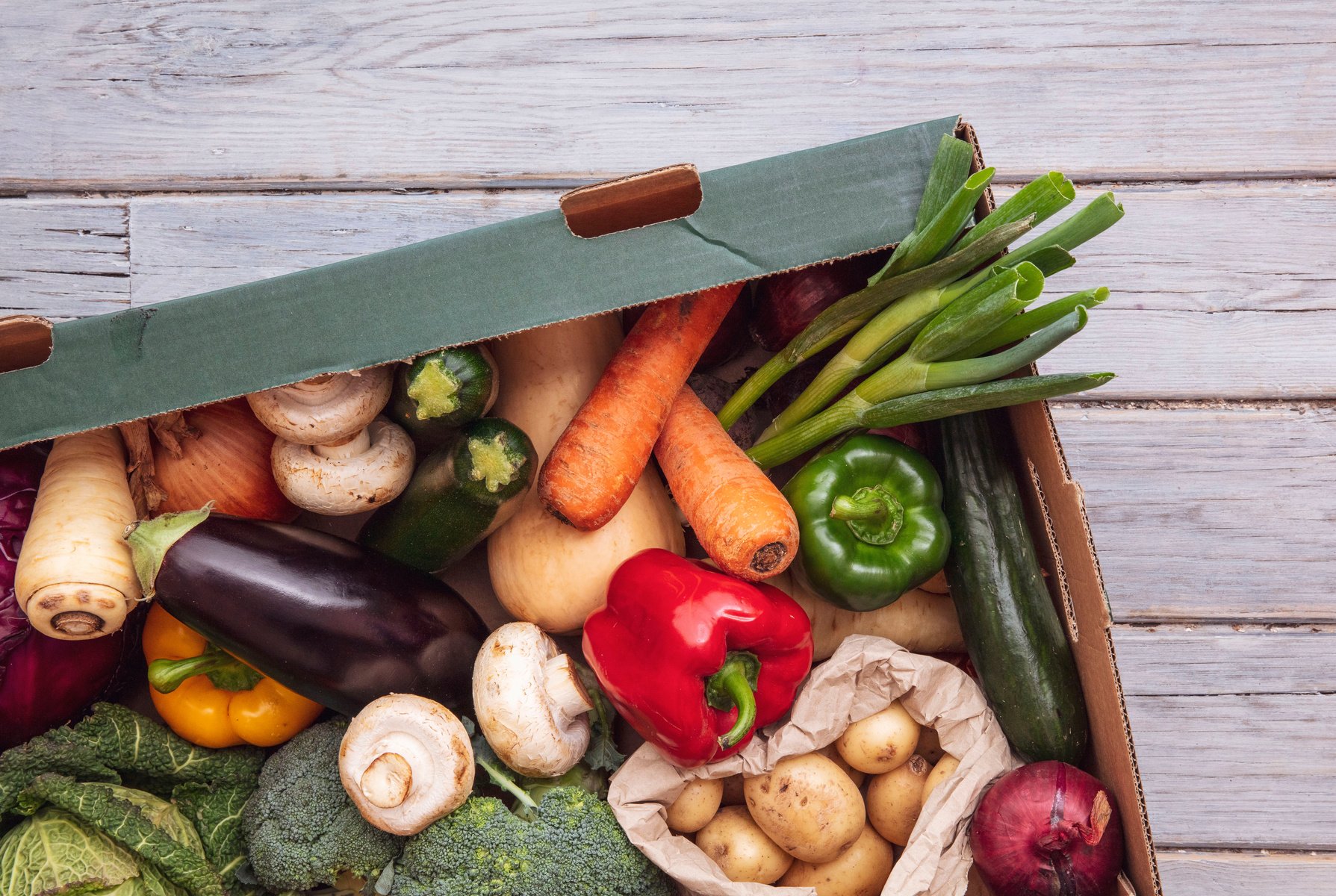 Fresh Vegetables on a Delivery Box 